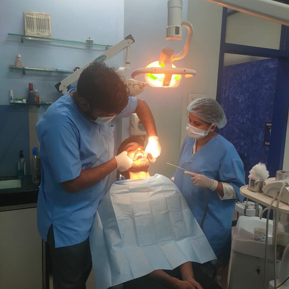 dental implants surgery and wisdom tooth removal surgery at asha clinic 
